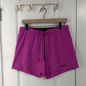 Nike Women's Bright Magenta Athletic Shorts with Black Swoosh